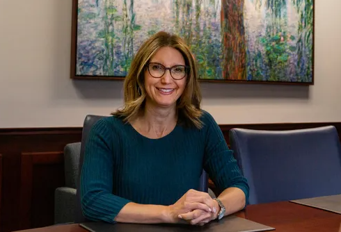 Jennifer Walters sitting at desk